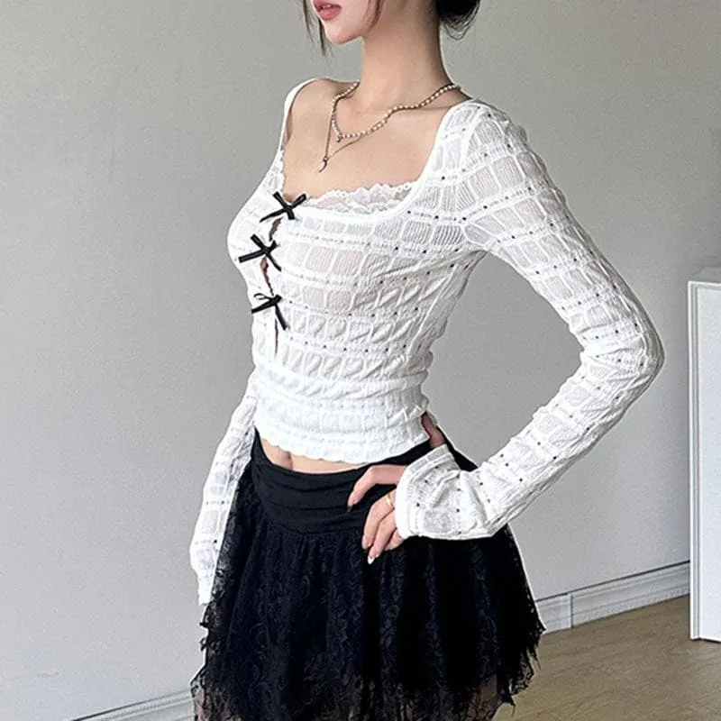 Long sleeve textured bowknot hollow out cut out top