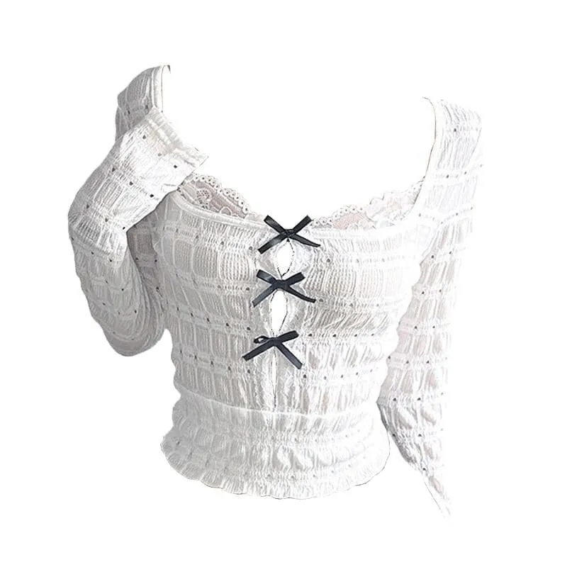 Long sleeve textured bowknot hollow out cut out top